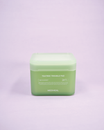 Imazh i tamponëve të pambukut/pads anti-plakje MEDIHEAL Retinol Collagen Lifting Pad (100 copë). Pads-at zvogëlojnë linjat e holla/rrudhat, ndihmojnë në elasticitet dhe zbehjen e shenjave të akneve me Retinol dhe Kolagjen me peshë të ulët molekulare.