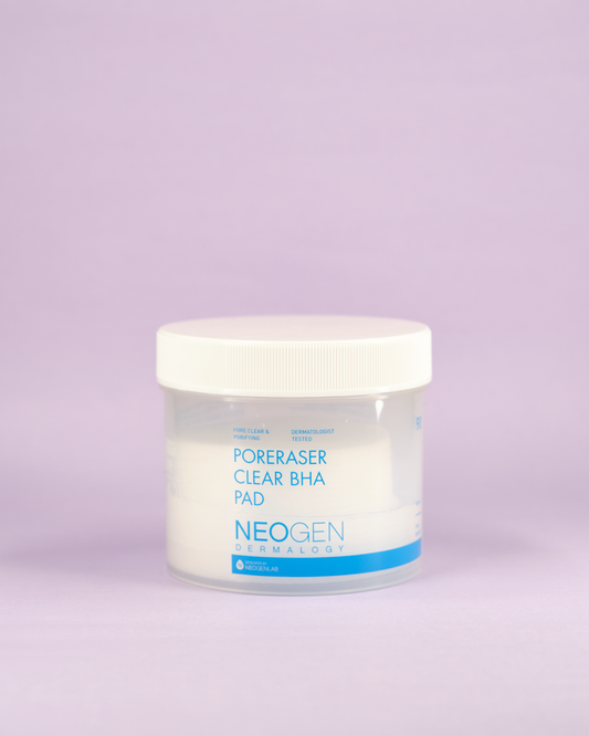 Imazh i tamponëve eksfoliues (Peeling Pad) 2-në-1 NEOGEN DERMALOGY Poreraser Clear BHA Pad (60 copë). Eksfoliuesi pastron poret, zvogëlon sebumin dhe largon qelizat e vdekura me acide BHA (Salicylic Acid)/AHA/PHA/LHA.