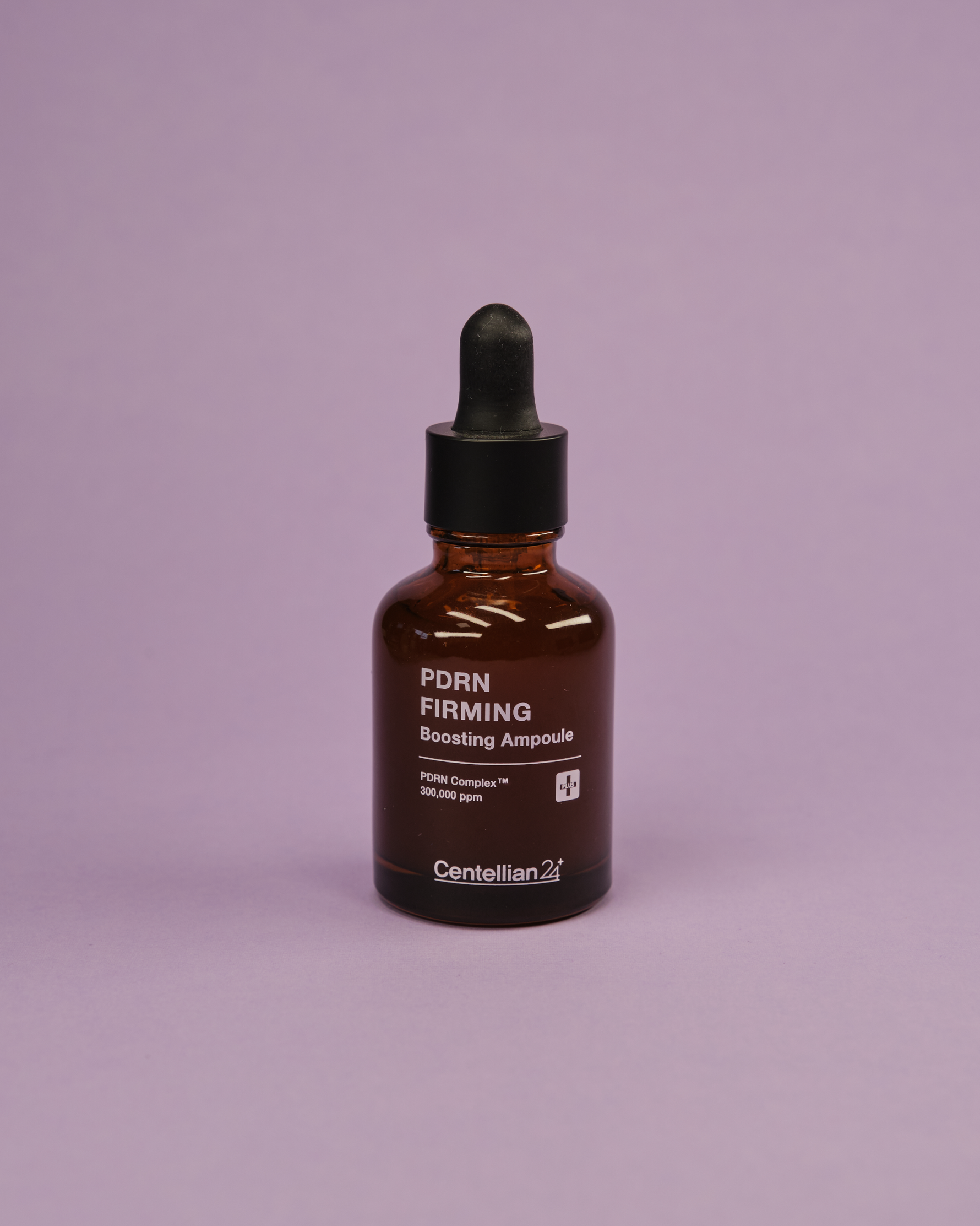Imazh i ampulës së fytyrës CENTELLIAN24+ PDRN Firming Boosting Ampoule (30ml). Ampula rigjeneruese përmirëson elasticitetin, qëndrueshmërinë dhe linjat e imëta me 30% kompleks PDRN™ (ADN Salmoni), Retinol dhe Panax Ginseng.
